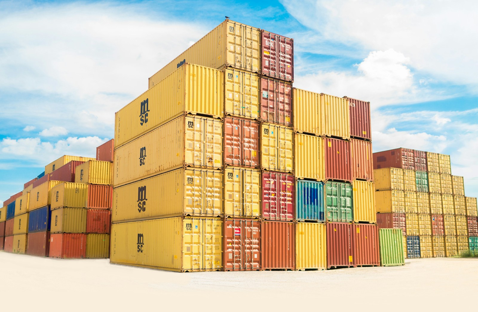 assorted-color filed intermodal containers with cargo insurance